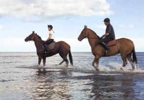 Pony trekking on the beach