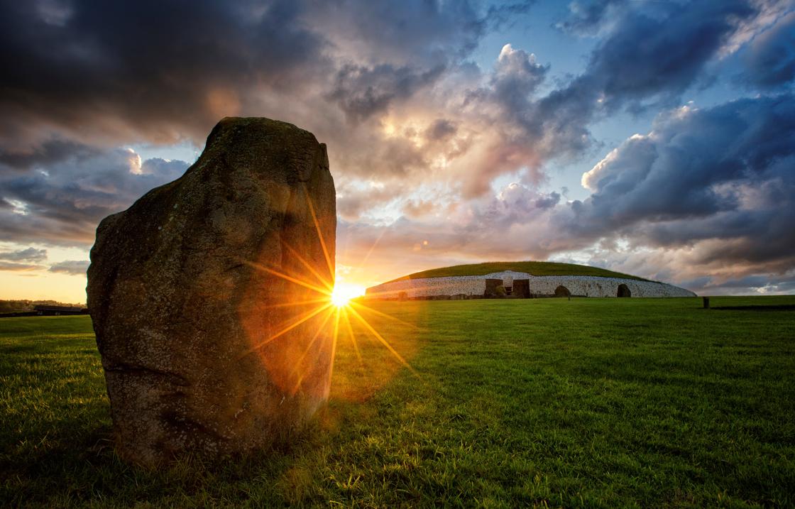 Newgrange with large stone in forefront