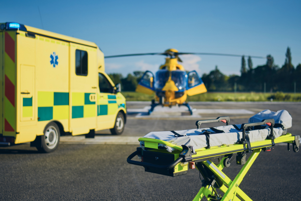 Ambulance, helicopter and stretcher