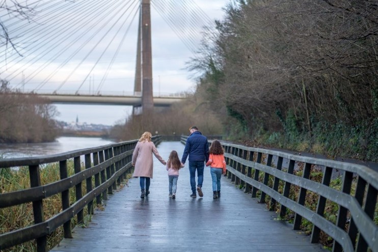 Family walking along Boyne Greenway