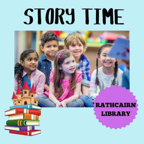 Storytime session with a group of smiling children listening to a story while seated on the ground