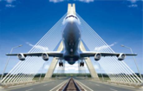 Airplane taking off with the Boyne bridge in the background