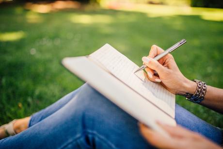 Woman writing in diary